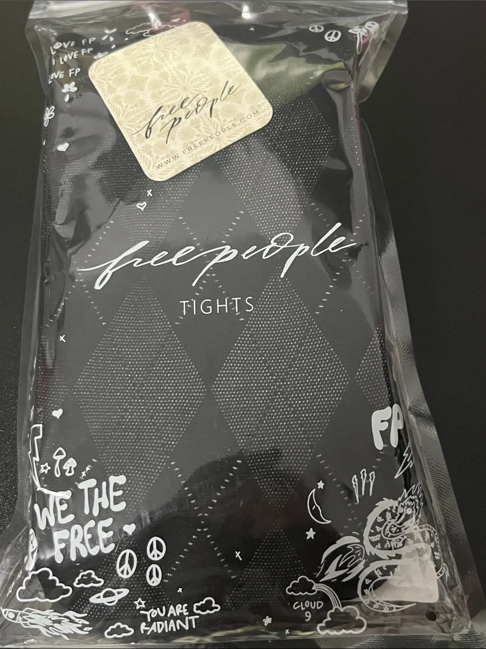 1536. FREE PEOPLE Diamond print tights in Black Sz M/L NWT $38